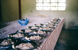 A row of bowls full of rice