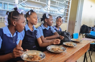 RS26721_Girls with food in class_0.jpg